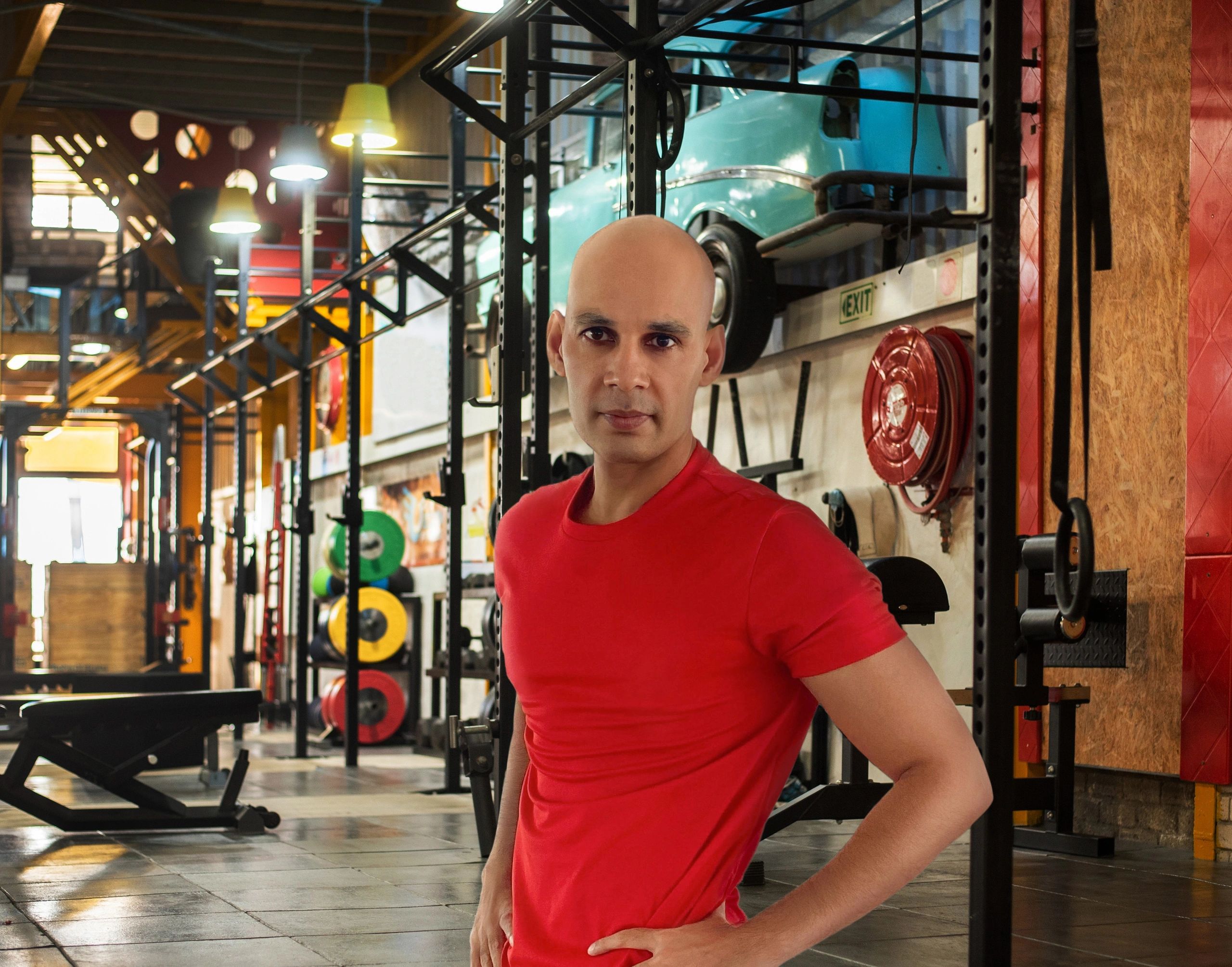 MFG online fitness trainer Manish Yadav in gym.