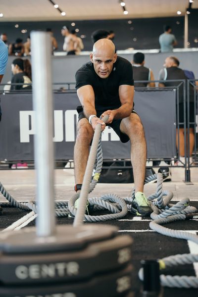 Manish Yadav is doing Sled Pull Workout.