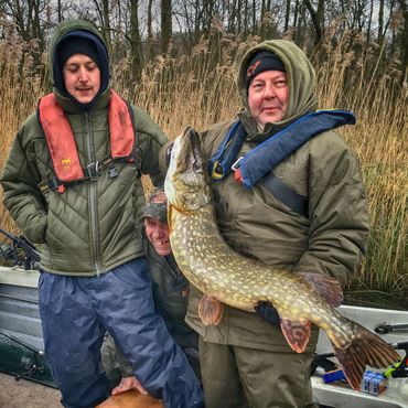 predator people clients with a lovely winter pike from the Norfolk broads