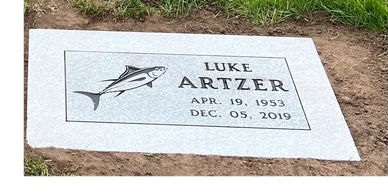 Gravestone with fish illustration for Luke Artzer.