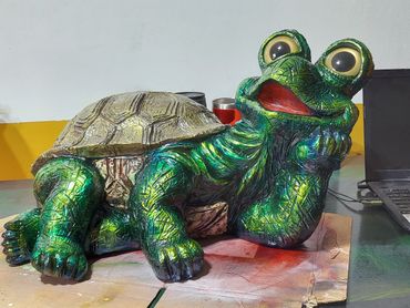 Fiberglass turtle airbrushed in Kandy paints