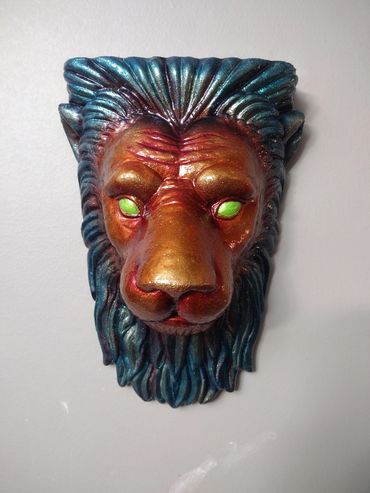 Plaster lion head airbrushed in Kandy paints
