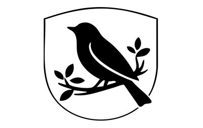 Silhouette of a bird on a branch within a shield.