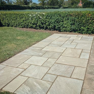 Patio extension installed in raj sandstone.