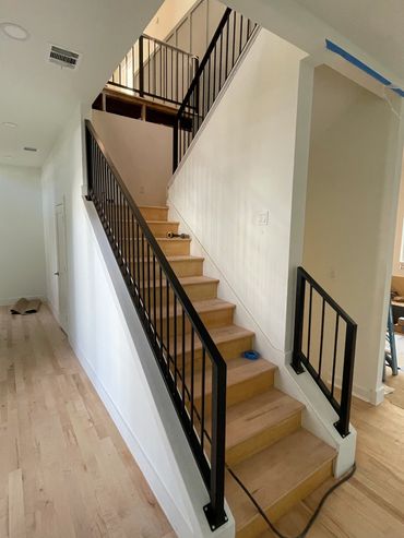 Custom Residential black stairwell handrail