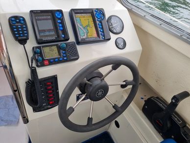Navman electronics including VHF and DSC radio 7200, Navman Fishfinder and Navman chart plotter. The