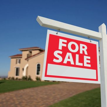A sign for a property sale