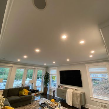 Living room with upgraded lighting.