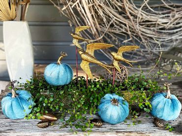Table Decorating with live plants and silk pumpkins and a touch of gold
