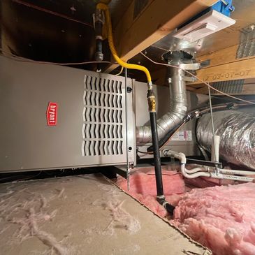 Bryant HVAC system installed in attic space.