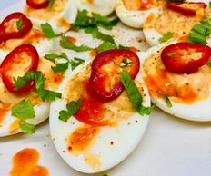 Smoked hot sauce deviled eggs.