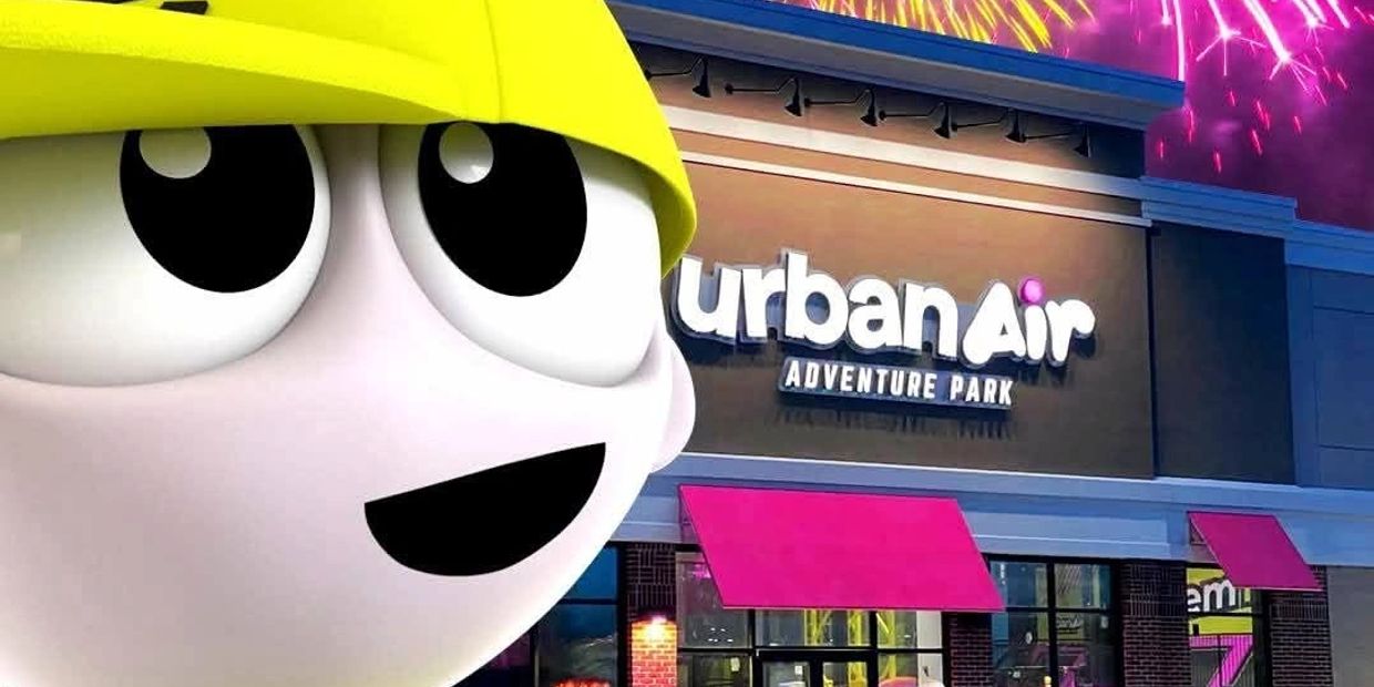 Mascot in yellow helmet at Urban Air Adventure Park.