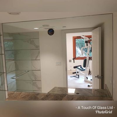 6 mm mirror measured, supplied and installed by A Touch Of Glass Ltd - North Vancouver.
