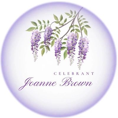 Elegant floral design with purple wisteria and the name Joanne Brown as celebrant.