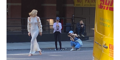 Candid photo of a photo shoot of a model in Tribeca, NY. Capturing the moment.