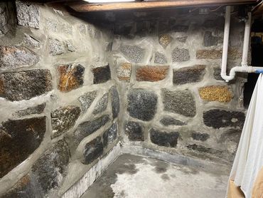 stone foundation re-pointing. stone basement wall repairs. stone foundation mortar repairs.