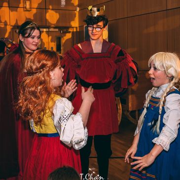 The King and Queen speak with Elsa and Anna.  Production of Frozen.