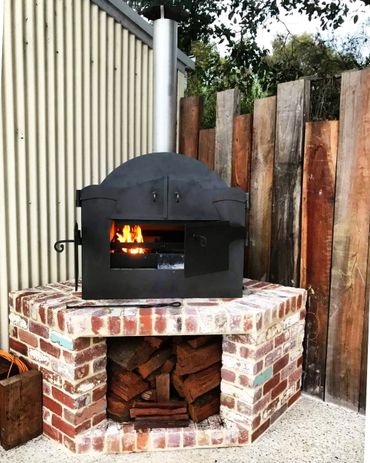 Beautiful setup with our Supreme wood fired oven on recycled brick base. 
