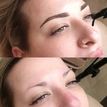 Freshly tattooed brows.