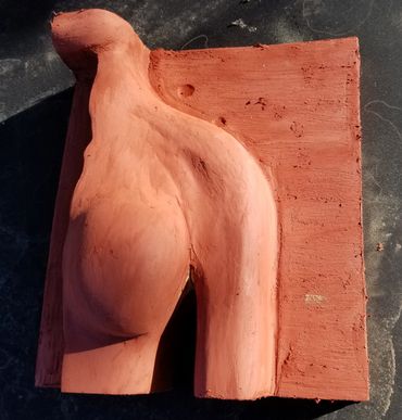 The torso covered with putty to cover the foam texture.