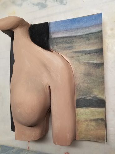 The torso with finished skin texture and background.