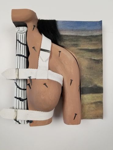 The finished piece with proper colors, nails in the skin, straps, and background.