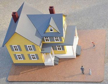 STEP 2 - A scaled model of a two-story house.