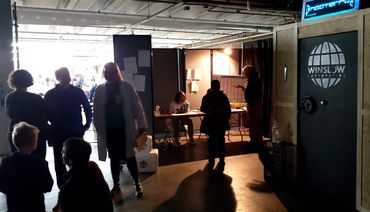 People standing around the entrance to Nocterra.