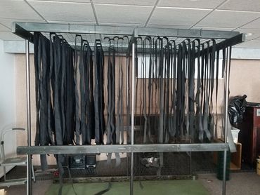 Exhibit during construction showing the hanging texture pieces.