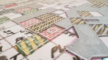 Close up of transparent tactile additions to the original map.