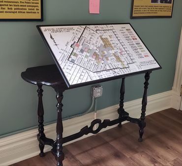 Tactile map sitting on supplied table at the Black American West Museum.