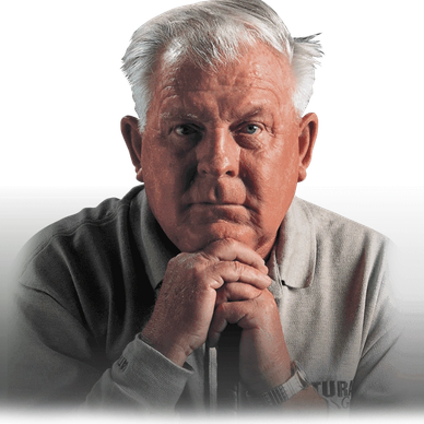 Thoughtful elderly man with white hair.