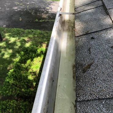 A clean gutter is done right the first time by the British Window Cleaner.