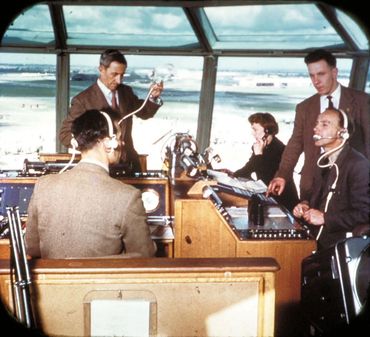 4 Aerodrome control staff at work in tower cupola