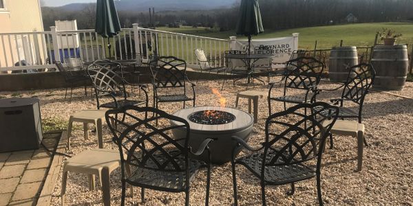 fire pit and view of the vineyard