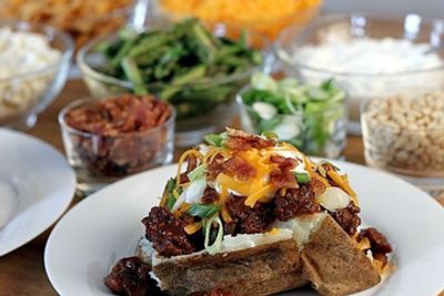 Baked potato with cheese, butter and sour cream