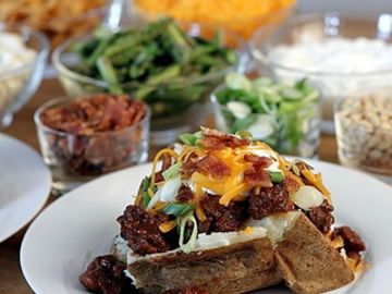 Baked potato bar with cheese and bacon