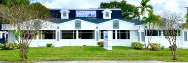 Front view of Mary’s Laundromart.