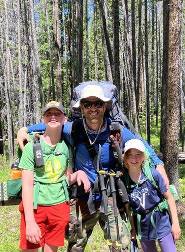 Mike Talia backpacking with his family.
