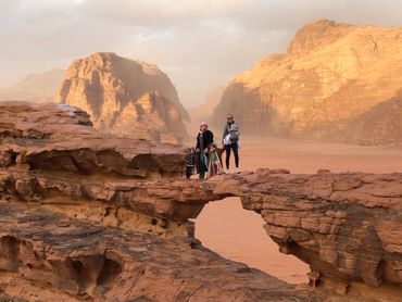 Family exploring the Wadi Rum Dessert in Jordan