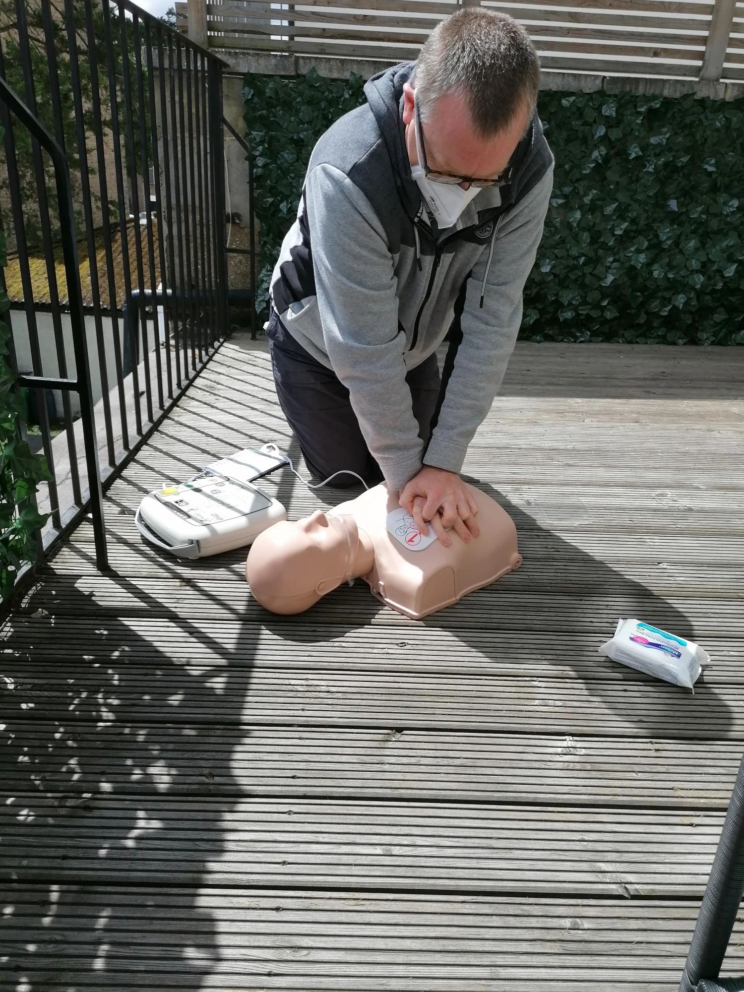 Covid safe CPR session, outside. Face coverings 121 training