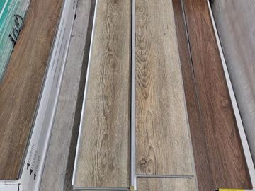 photo of various end of skid vinyl click flooring