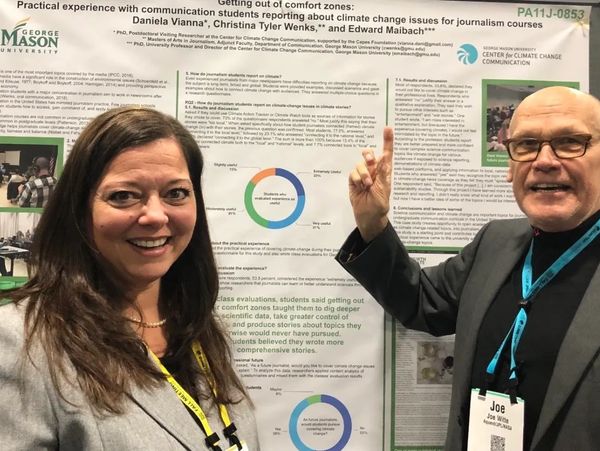 Christina Tyler Wenks discusses research data with NASA JPL's Joe Witte at the AGU Fall Meeting 2018