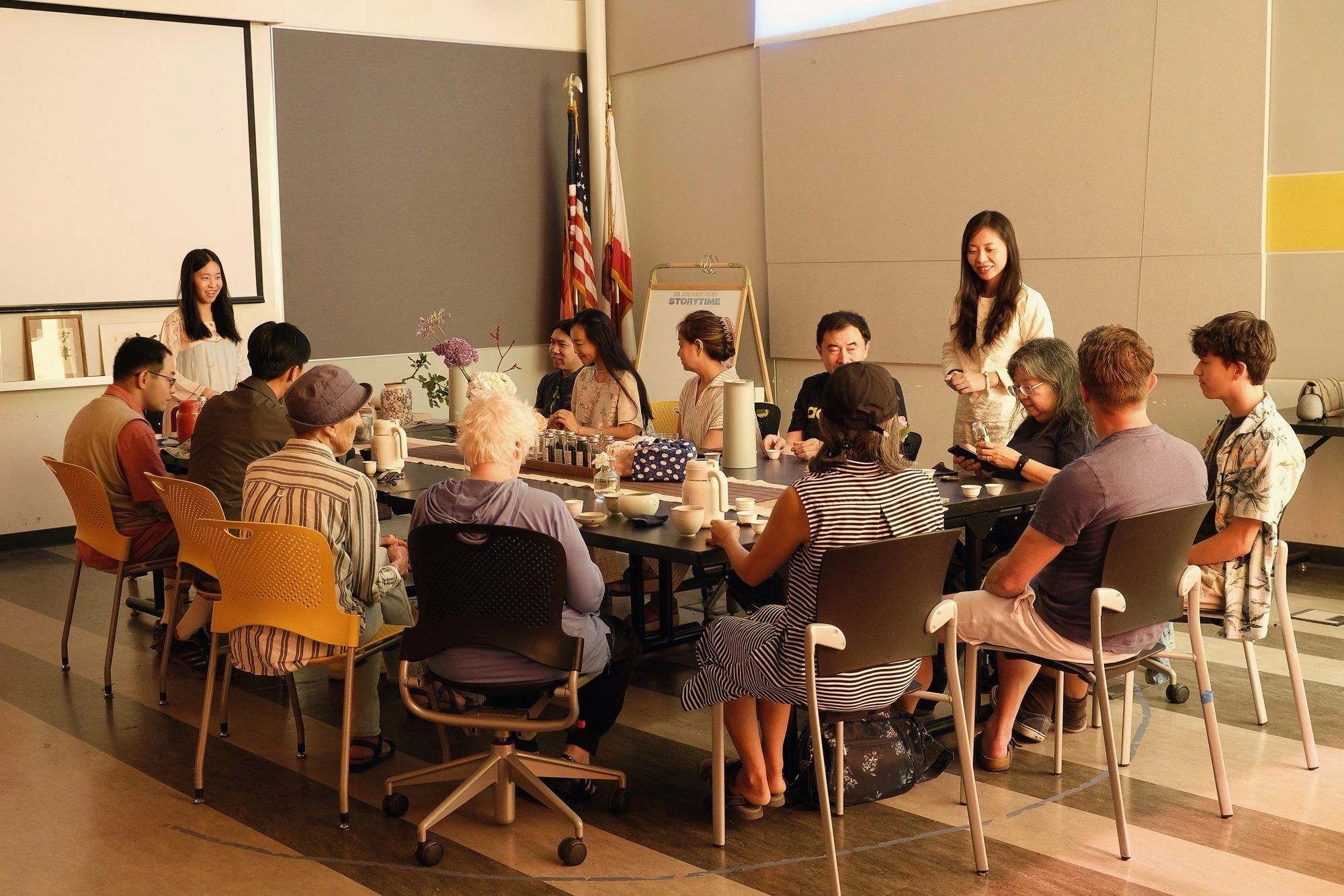 Residents sharing tea at an ACHEA community tea circle at Calabazas Branch Library, San José