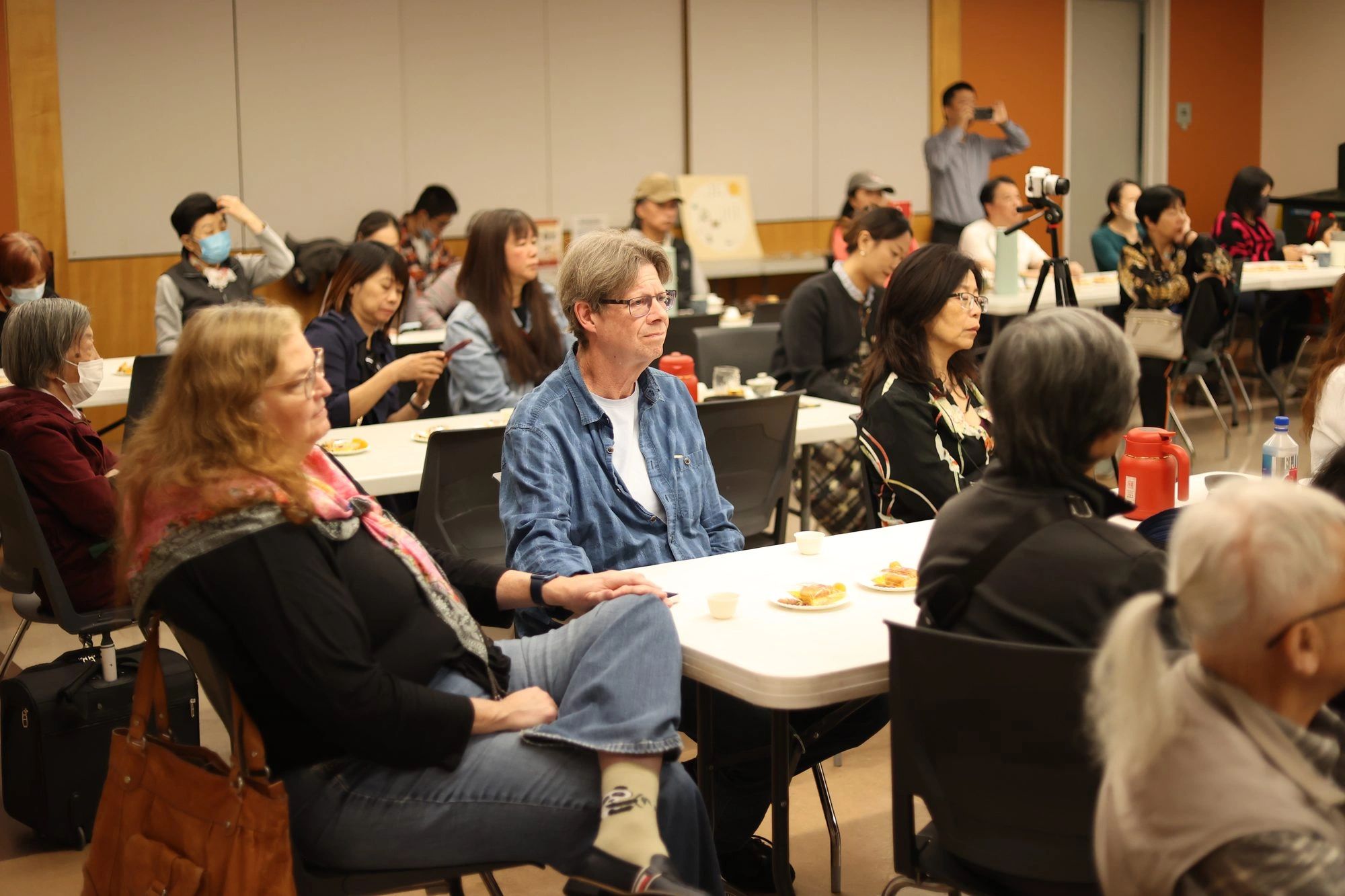 Participants of different ages at an ACHEA tea culture program at the San Francisco Public Library
