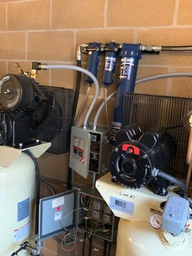 AS-2 controls 2 Ingersoll-Rand Type 30 Air Compressors.