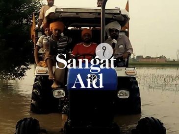 Group of men on a tractor in a flooded area with text 'Sangat Aid' overlay.