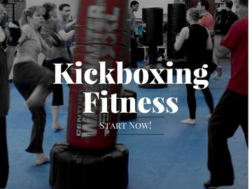 Group kickboxing fitness class in session.