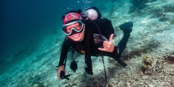 PADI DIvemaster anne is scuba diving