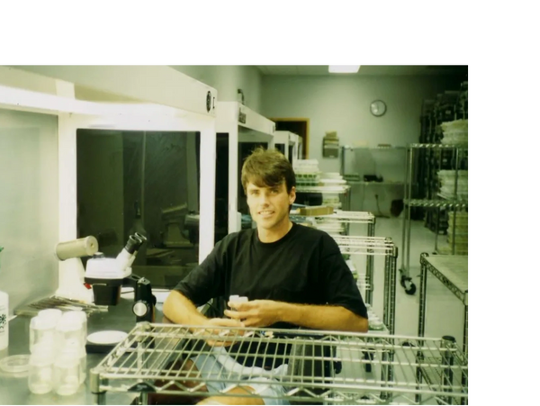 A young Bill Graham in a plant tissue culture lab.